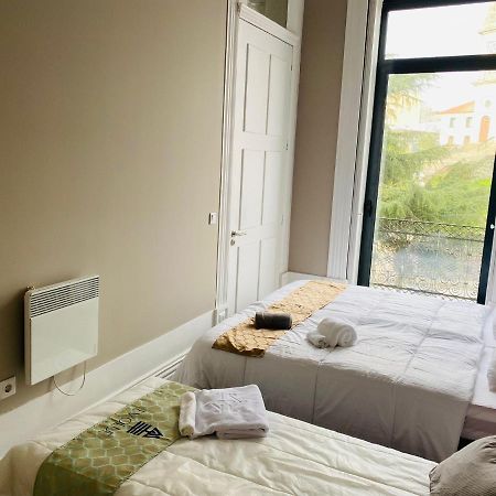Evolue Hotel Porto Bagian luar foto
