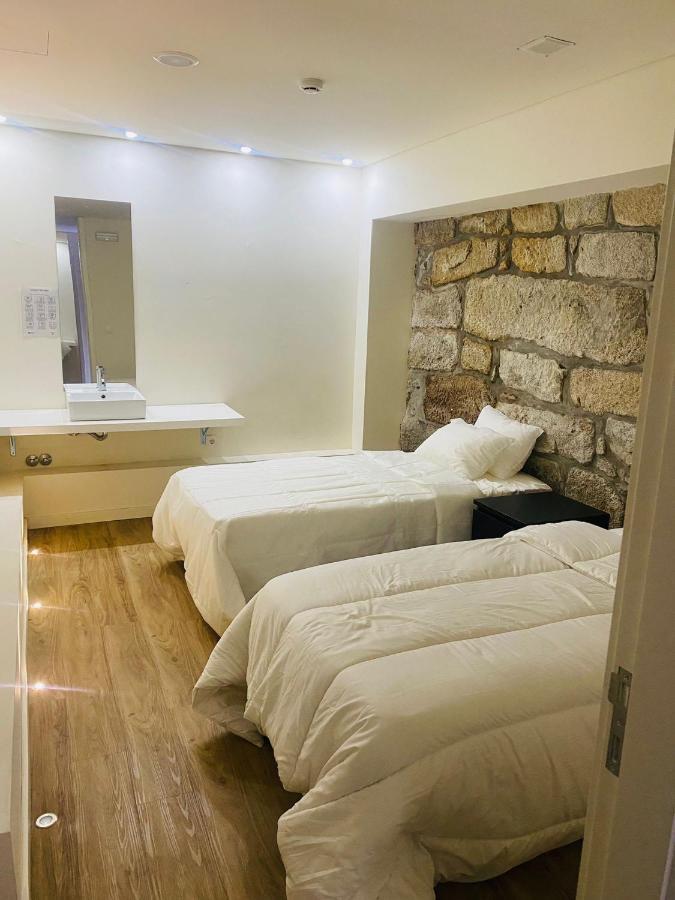 Evolue Hotel Porto Bagian luar foto