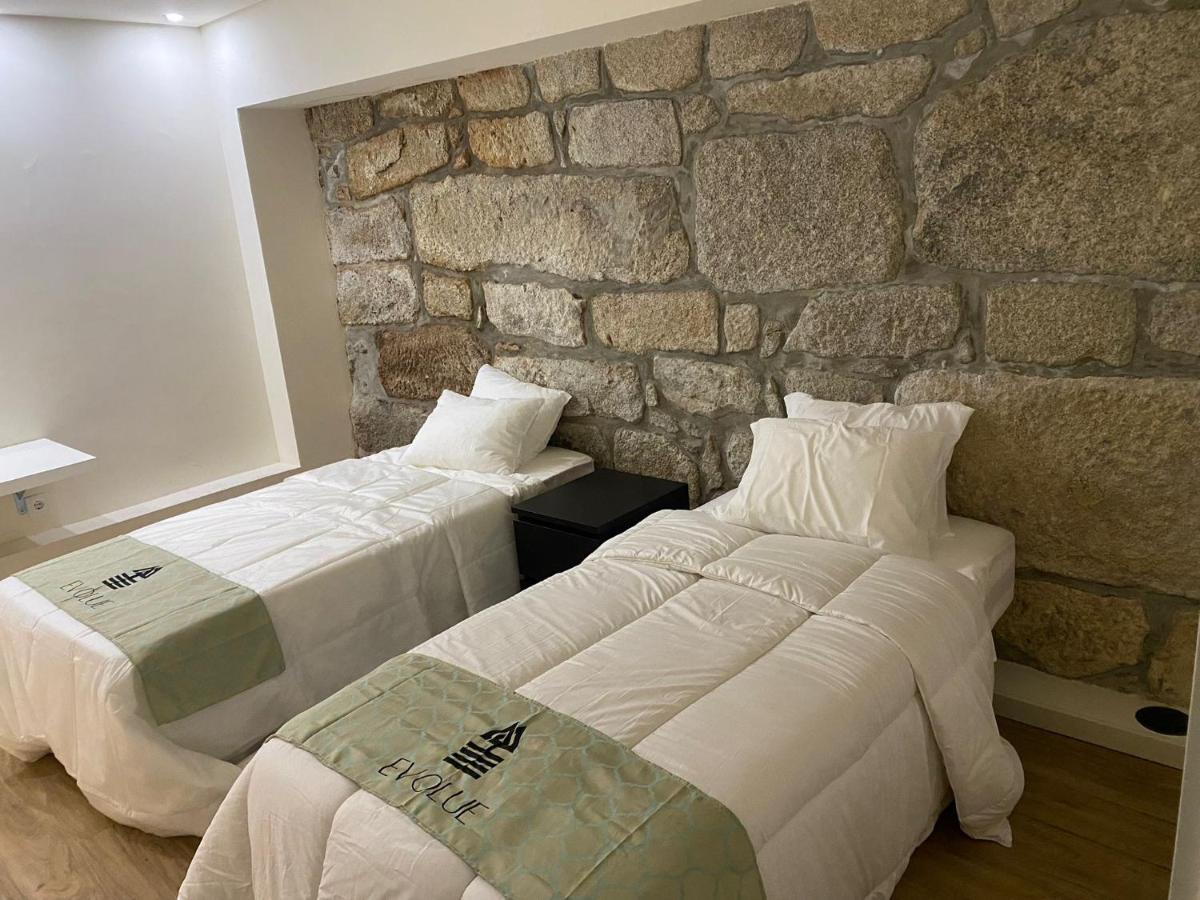 Evolue Hotel Porto Bagian luar foto