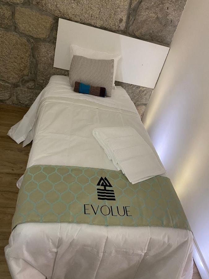 Evolue Hotel Porto Bagian luar foto
