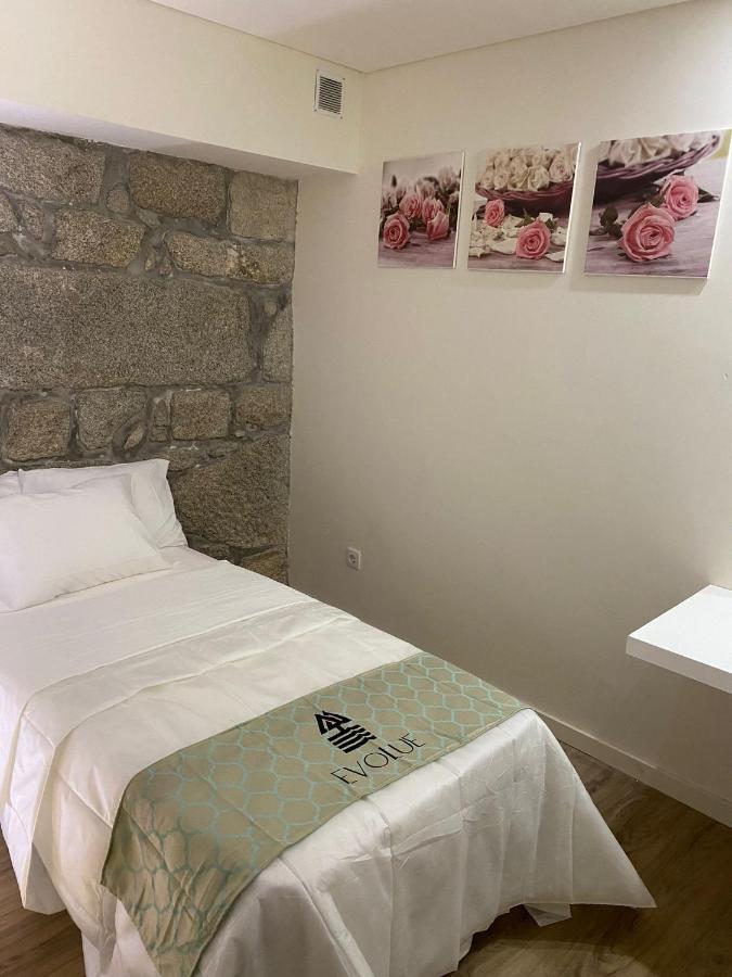 Evolue Hotel Porto Bagian luar foto
