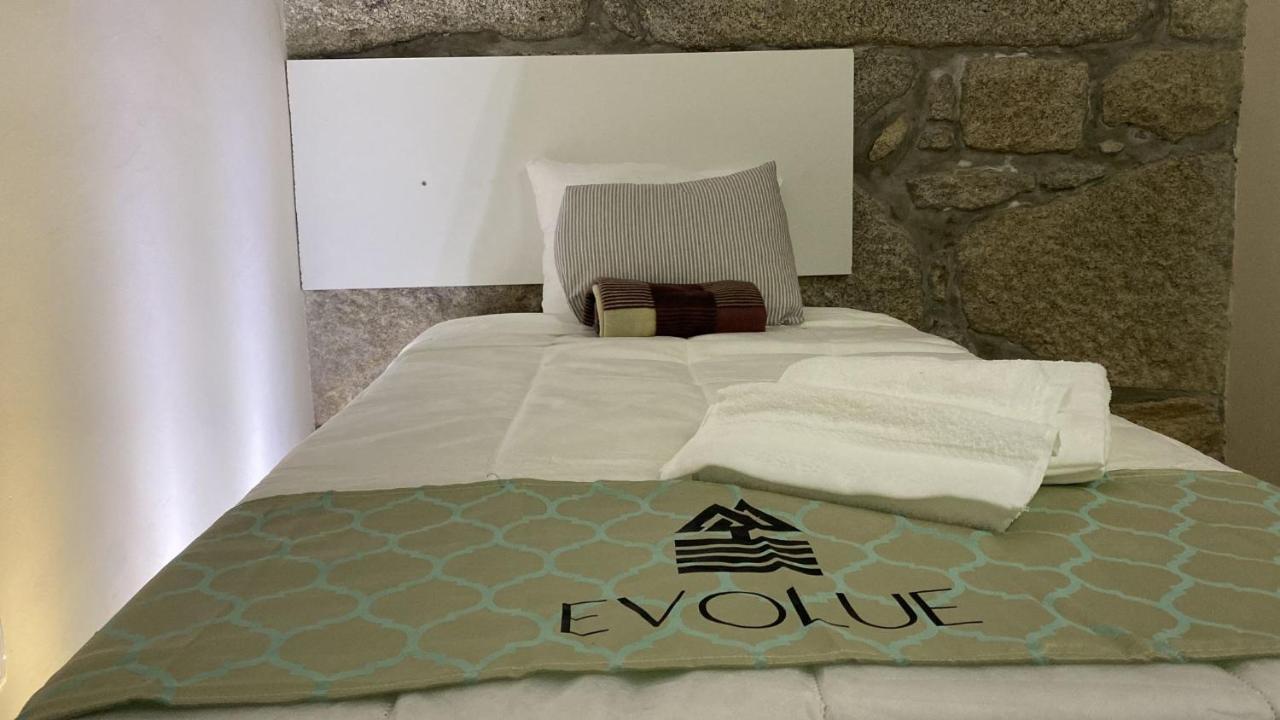 Evolue Hotel Porto Bagian luar foto