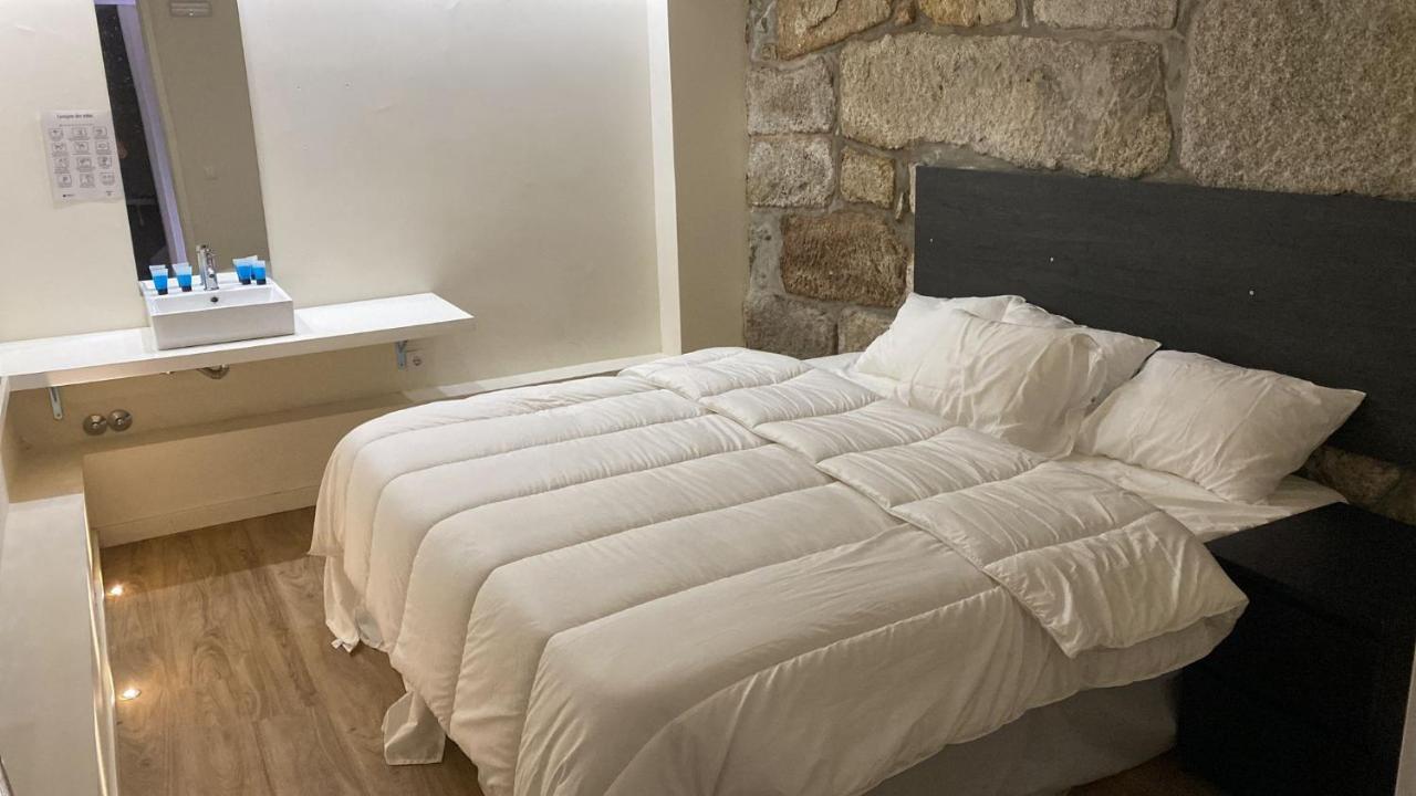 Evolue Hotel Porto Bagian luar foto