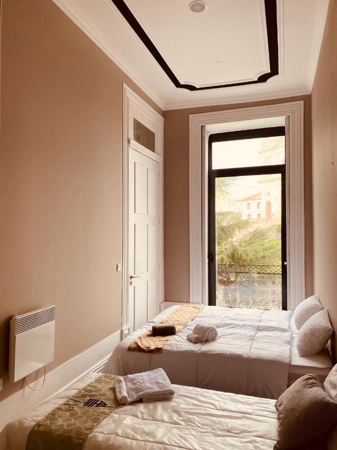 Evolue Hotel Porto Bagian luar foto