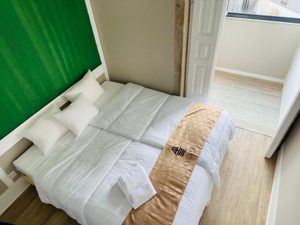 Evolue Hotel Porto Bagian luar foto