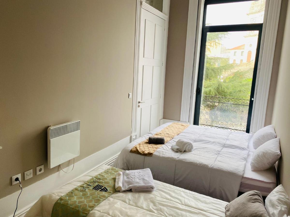 Evolue Hotel Porto Bagian luar foto